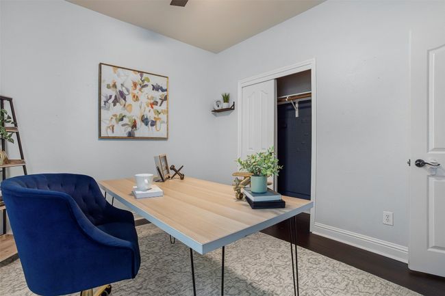 Office space featuring wood finished floors, baseboards, and ceiling fan | Image 26