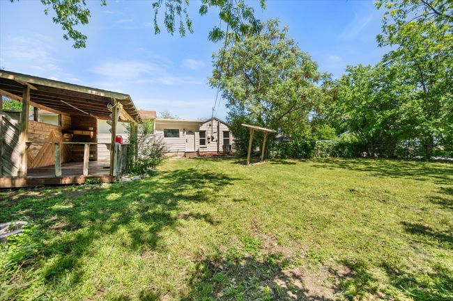 View of green lawn with a deck | Image 23