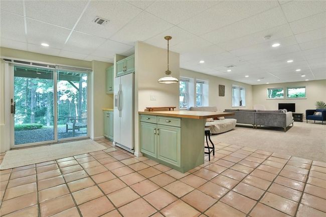 Full walkout lower level with sliders | Image 26