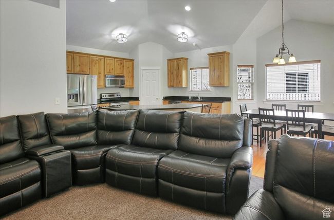 Living area with vaulted ceiling | Image 9
