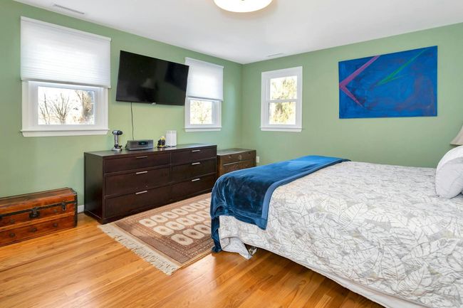 Primary bedroom has en-suite bath and has large double door closet. | Image 16