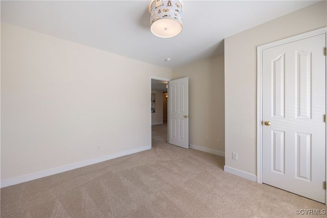 Bedroom #2. Note the adorable ceiling light fixture. | Image 26