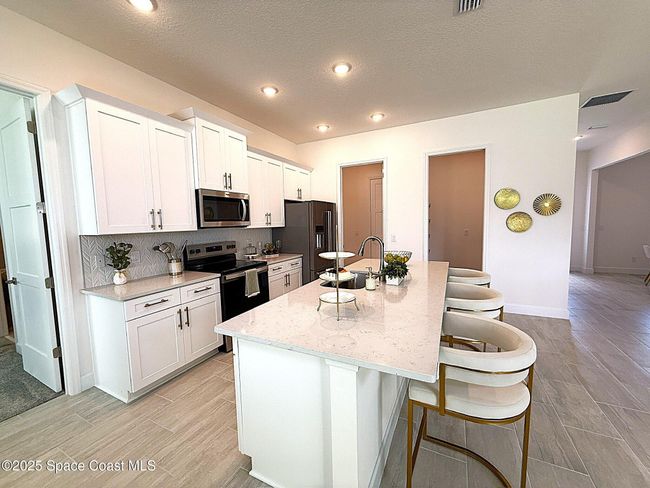 1055 Dolores Rd Ne, House other with 4 bedrooms, 2 bathrooms and null parking in Palm Bay FL | Image 12