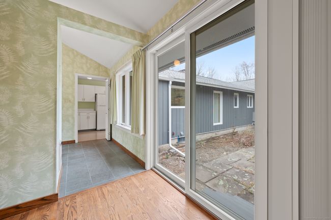 Kitchen leads to Foyer and Media Room/Office. | Image 16