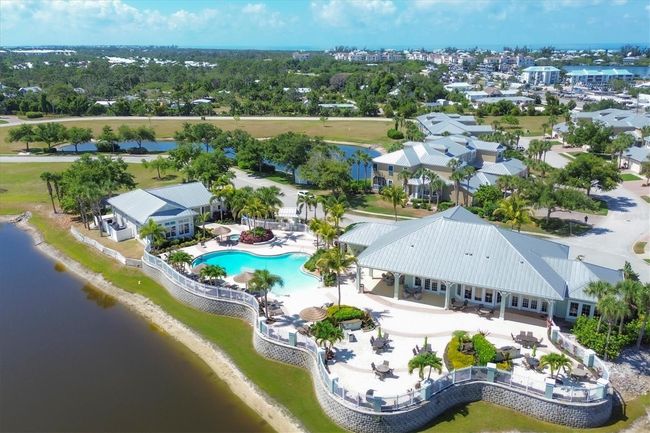 Spacious community pool deck includes grills | Image 46