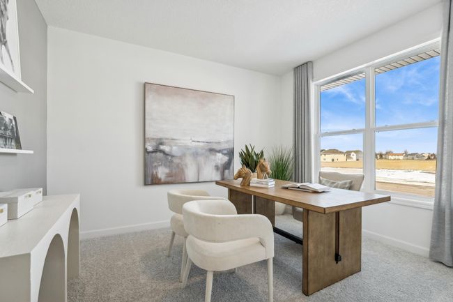Photo is of the actual model. This main level study provides a perfect setting for those working from home, paying bills or completing a school project. | Image 14