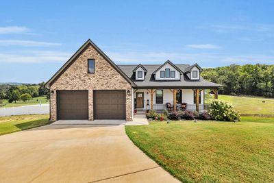 Pretty covered front porch | Image 3