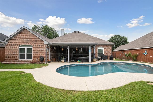 View of pool featuring a patio | Image 26