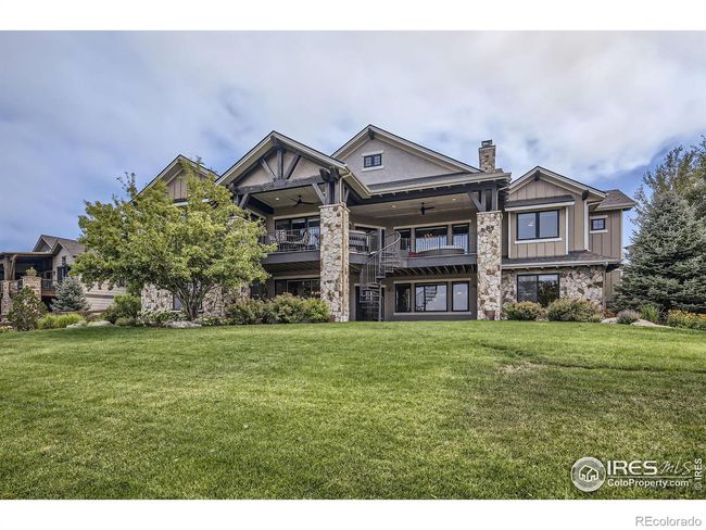 Exterior backyard complete with full fencing, gorgeous landscaping and sprinkler system! | Image 37