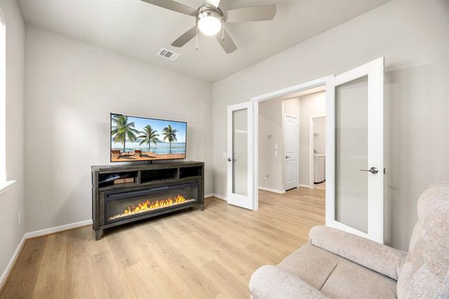 Formal Study with French doors with glass panes. | Image 22