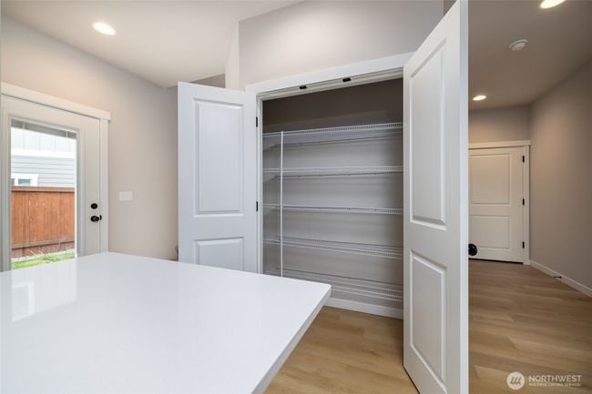 Pantry closet in kitchen. | Image 12