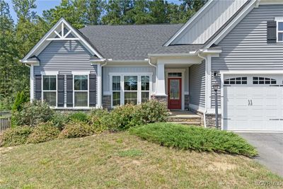 Craftsman home with main level living and three bedrooms and three bathrooms | Image 2