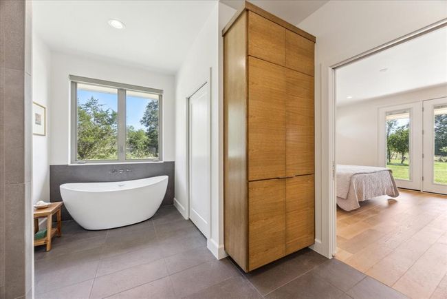 Spa Like Primary Bath with Free Standing Tub and Separate Shower | Image 5