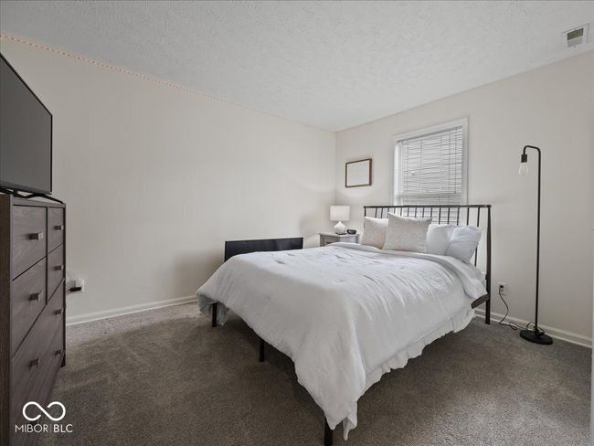 Bedroom featuring with carpet | Image 15
