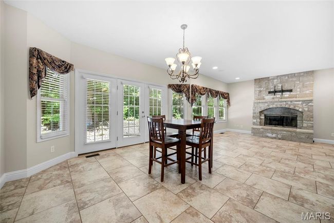 So many windows! Beautiful stone, gas Fireplace #2! | Image 15