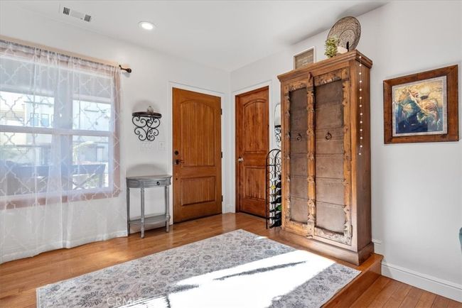 Entry. The door to the right leads to the garage. | Image 9