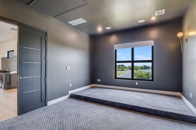 Media room featuring grey colored carpet and recessed lighting | Image 23