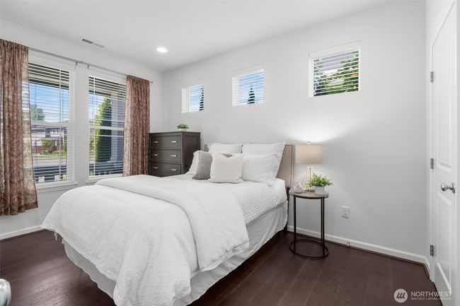 MAIN FLOOR BEDROOM (or den/office/work-from-home space) with walk-in closet & adjoining 3/4 bathroom! | Image 14