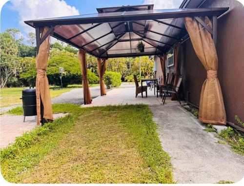 214 Westwood Cir E, West Palm Beach, FL, 33411-4402 | Card Image