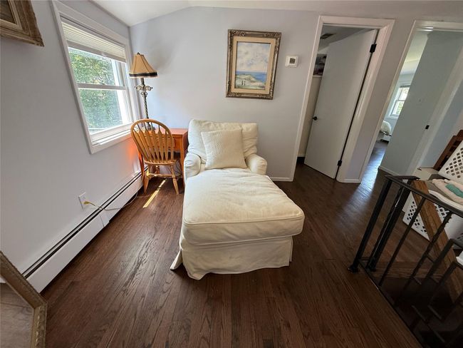 Additional space upstairs works perfectly as a quiet reading nook or Office space.. | Image 17