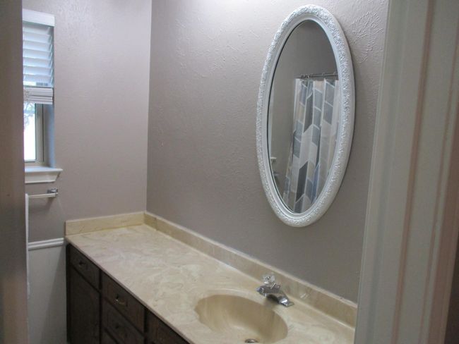 Bathroom featuring vanity | Image 7