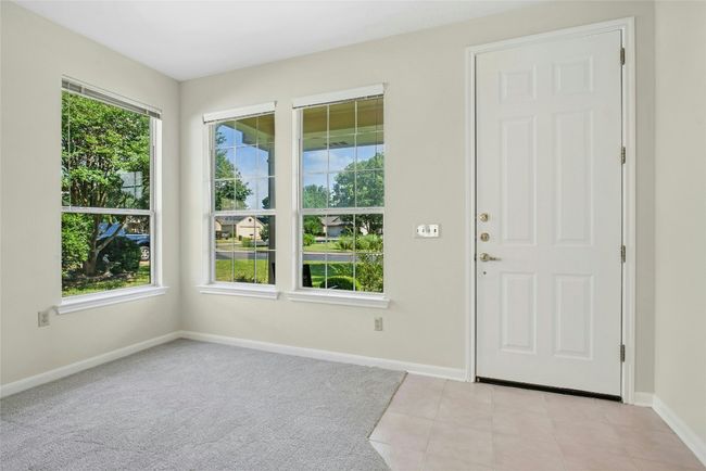 Foyer featuring baseboards and healthy amount of natural light | Image 5