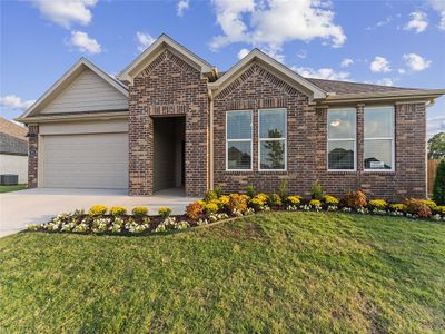 Charming Coleman plan. Stock photo for the Coleman in Goose Creek Village. Beautiful stock photo of the Plan. Elevation and brick/paint colors vary. | Image 1