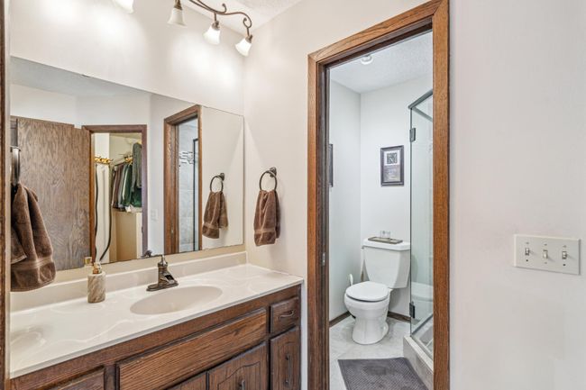 Private 3/4 owners suite bathroom with an elegant walk-in shower. | Image 24