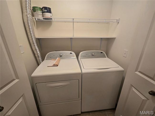 Laundry room with separate washer and dryer | Image 15