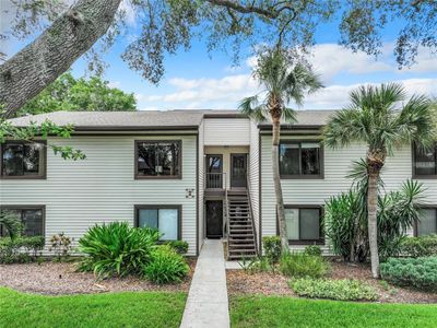 330 Moorings Cove Drive, Condo with 3 bedrooms, 2 bathrooms and null parking in Tarpon Springs FL | Image 1