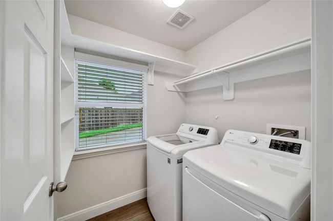 Notice the additional shelving by the door customized to perfectly fit in this space and give you all the extra storage you need! | Image 24