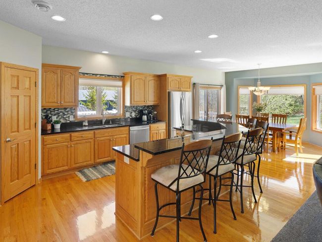 Two Tiered Center Island with granite counters - 25259 Galaxy Ave Wyoming MN 55092 USA-037-077-037-MLS_Size.jpg | Image 15