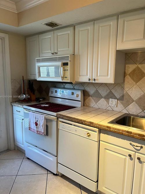 407-3200 N Palm Aire Dr, Pompano Beach, FL, 33069-3886 | Card Image