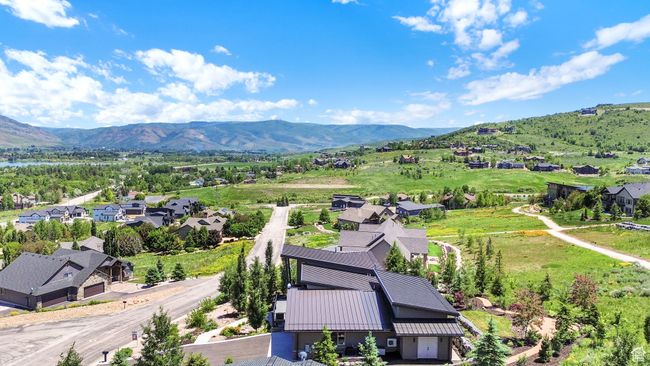Aerial view of residential area featuring a mountain backdrop | Image 110