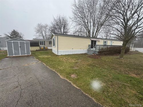 61 Bee Jay Dr, Lansing, MI, 48906-2313 | Card Image