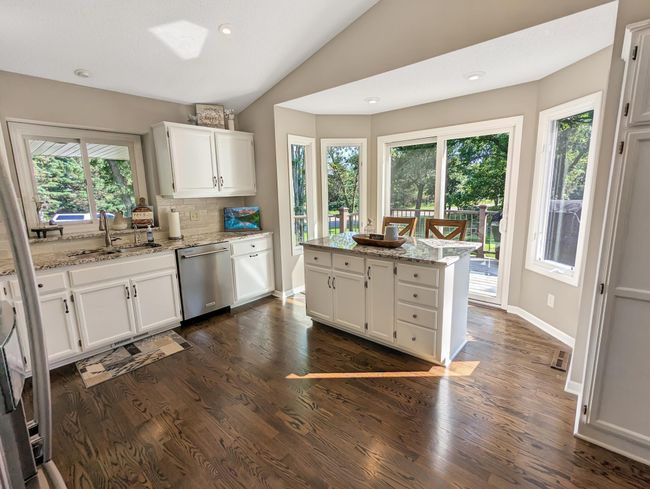 huge kitchen walks out to deck for grilling and chilling in your gazebo. | Image 7