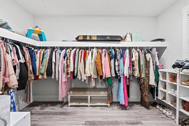 Spacious closet featuring wood finished floors | Image 22