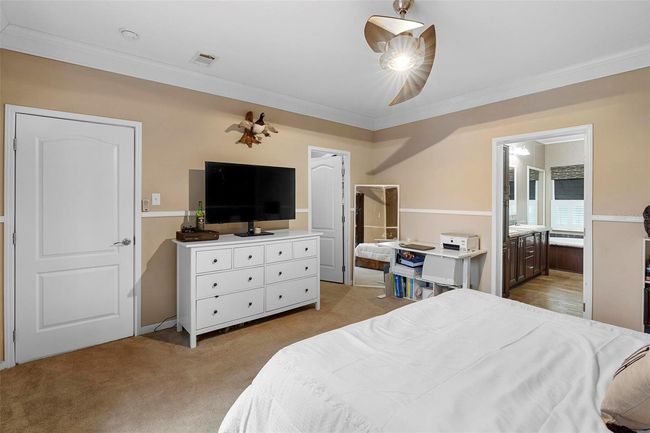 Primary bedroom entrance and walk-in closet | Image 18