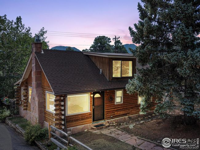 Come home and spend your quiet evenings nestled into this Estes Park treasure. | Image 26