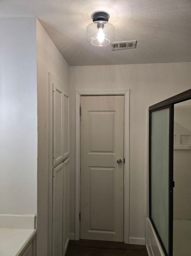Hallway with dark wood-type flooring | Image 15
