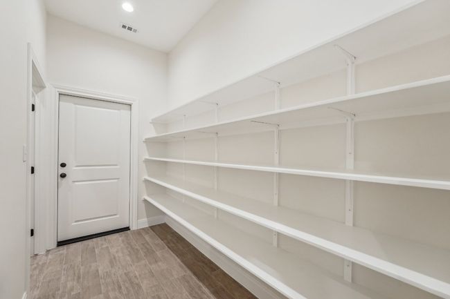 Pantry featuring built in shelving | Image 17
