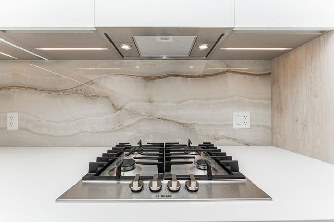 Interior details featuring stainless steel gas cooktop | Image 10