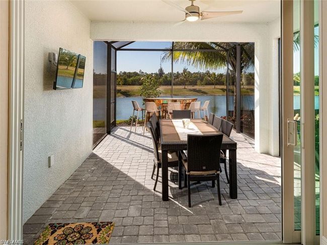 View of patio / terrace with ceiling fan | Image 15