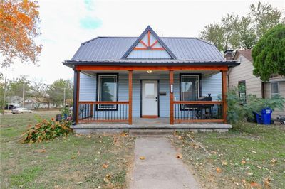 View of front of property featuring covered porch and a front lawn | Image 2