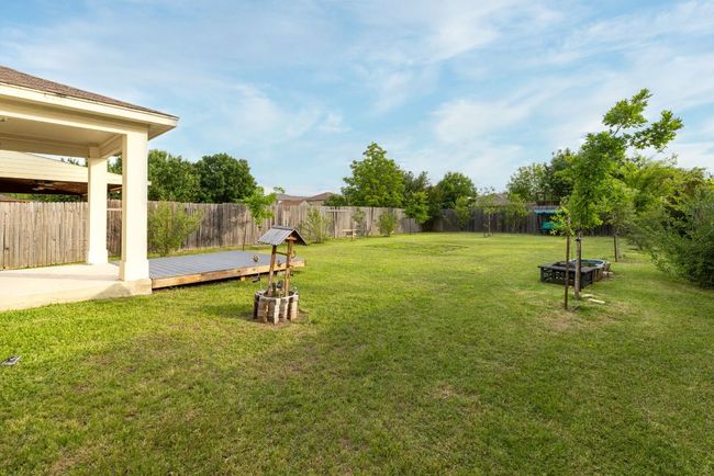 View of yard with a wooden deck | Image 34