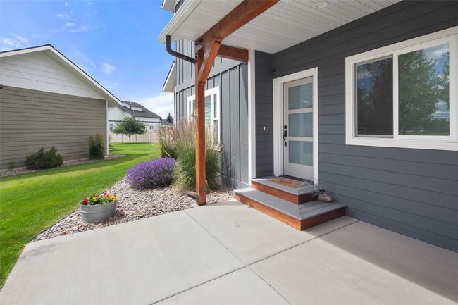 Covered front patio. | Image 16