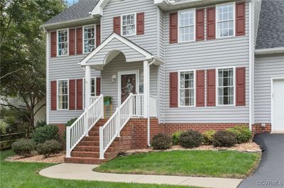 View of front facade with brick stairs | Image 3