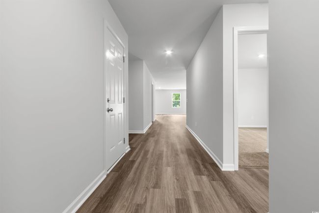 Corridor featuring hardwood / wood-style floors | Image 4