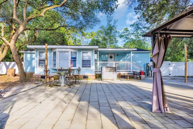 Rear view of property with a wooden deck | Image 22