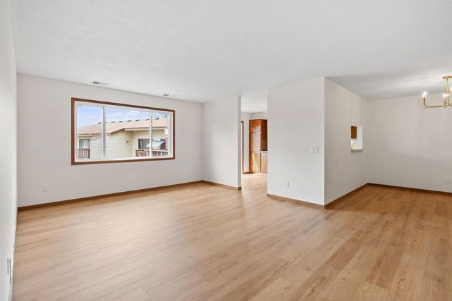New large widows flood the rooms with natural light. | Image 4